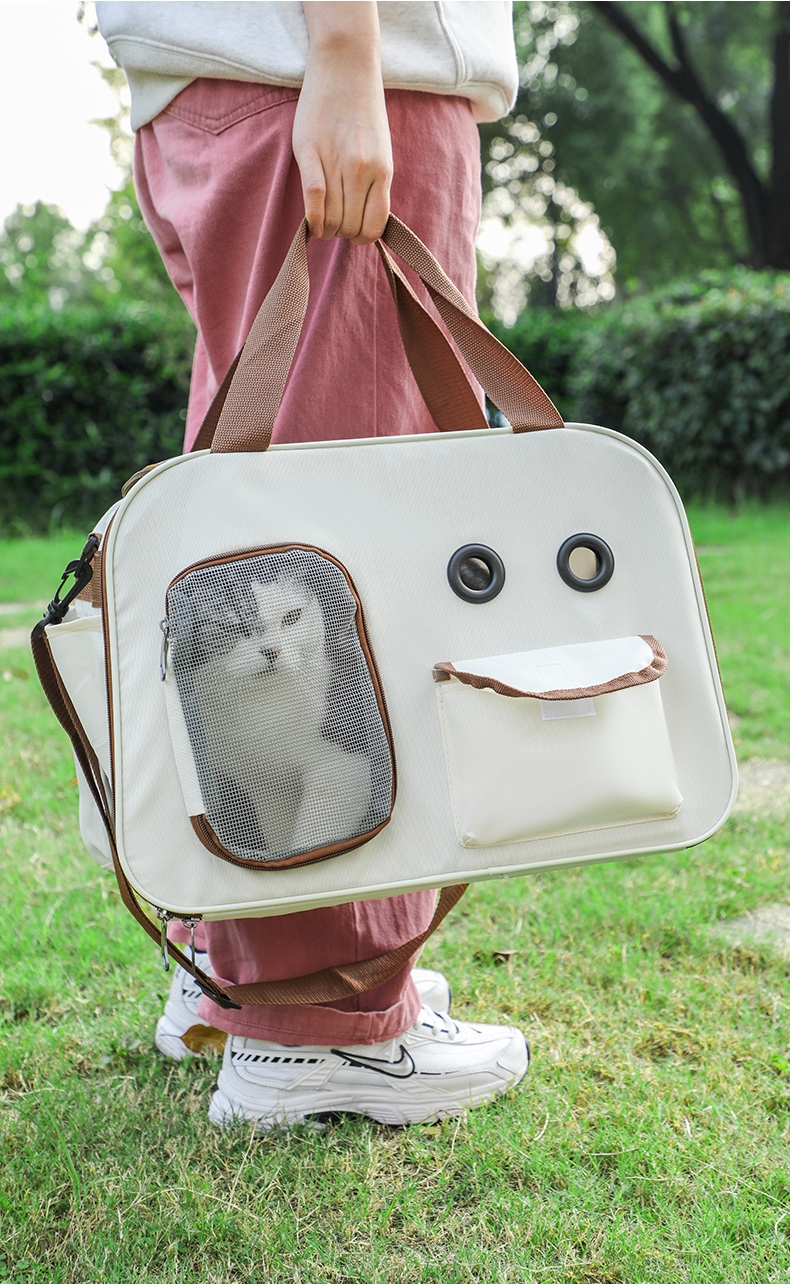 玩尾 大眼两用猫包米色拼咖啡色